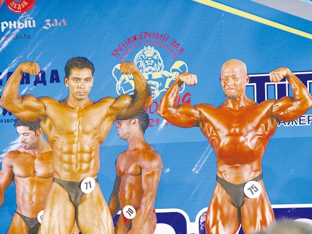65kg級インドのクマール（7位・左）と重岡