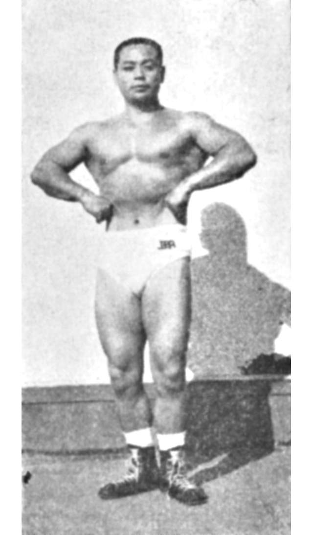 アフター現在の写真。体重 97kg、胸囲 120cm、腕囲 40cm、腿囲 60cm。1967年度全日本実業団ボディコンテストにみごと優勝。